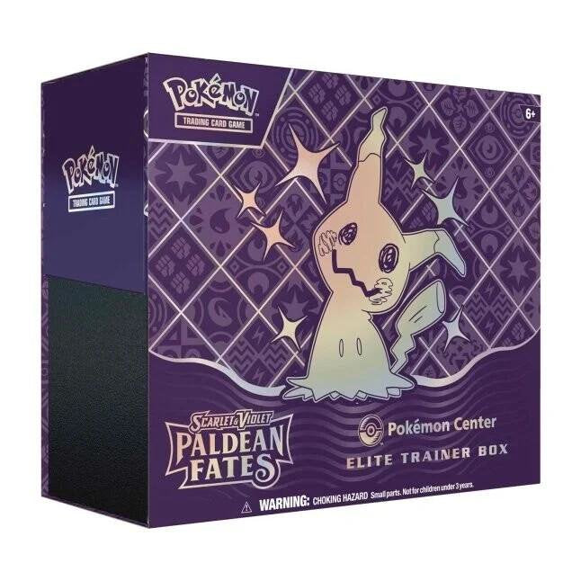 Pokemon TCG Paldean Fates Pokemon Center Elite Trainer Box with booster packs and accessories.
